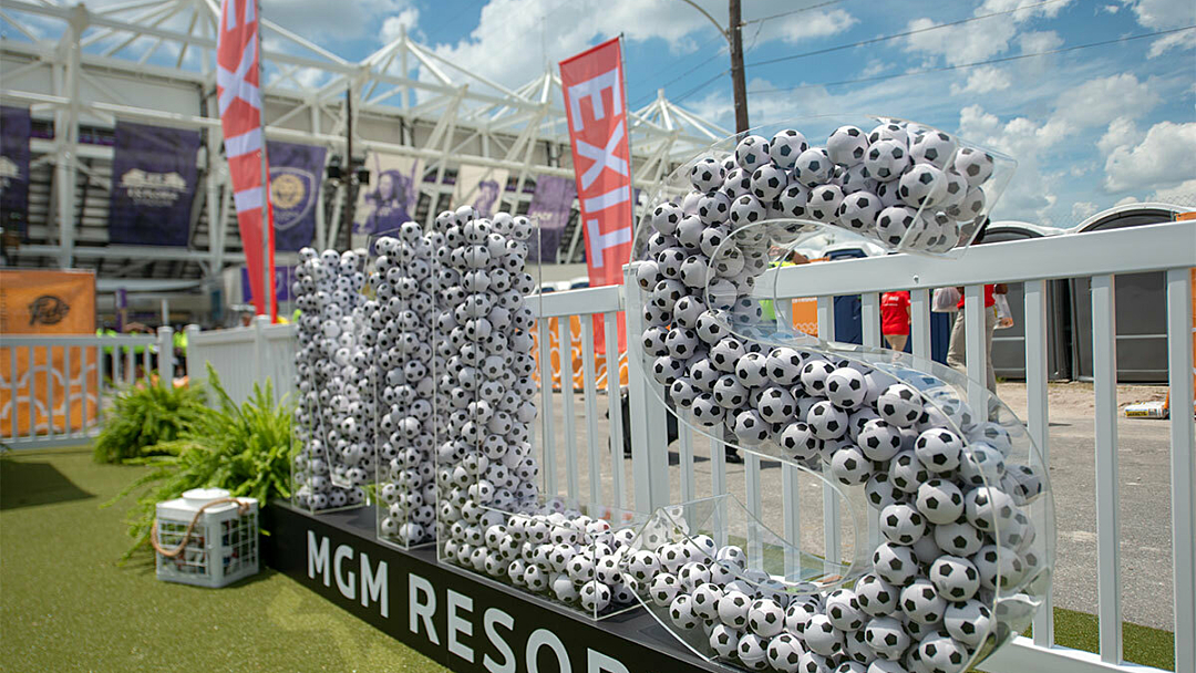Custom letters that spell out MLS with tiny soccer balls
