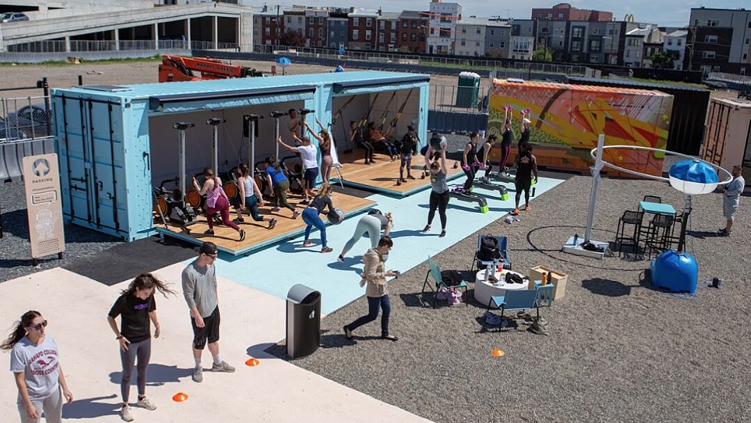 BoxPop shipping container being used for cardio exercise event