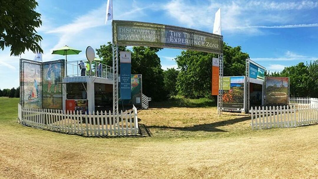 Custom event truss and banners at a fan activation for the LPGA