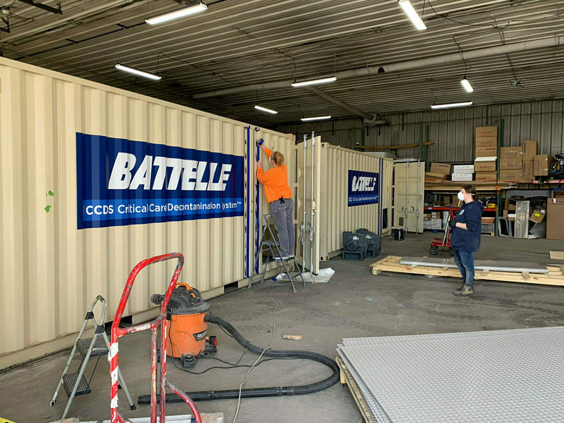 Battelle BoxPop container being worked on