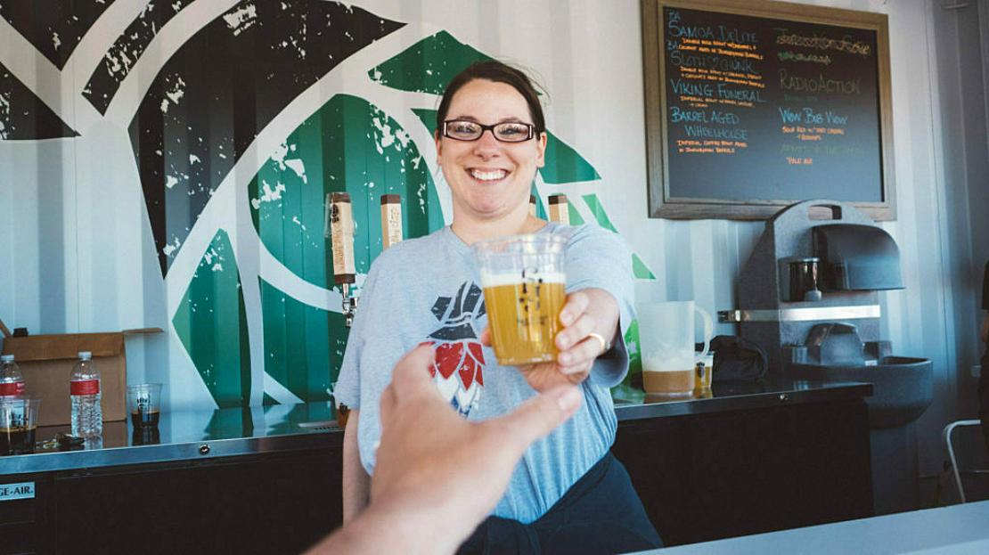 beer being served in a boxpop shipping container