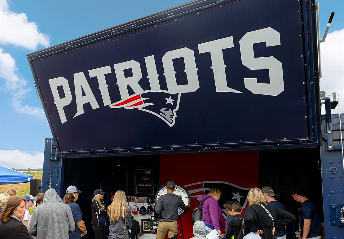 BoxPop shipping container set up for fans at a New England Patriots game